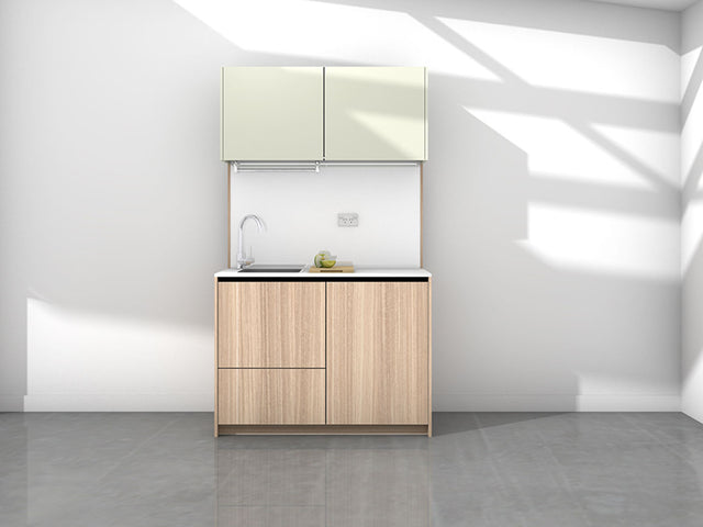 Charlie - 1.2m Compact Wall Unit Kitchenette. Displayed with 'Simply Eucalyptus and Pistachio' Cabinetry, 'Style White' Benchtop, and 'Sheer Bliss White' Splashback