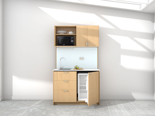 Charlie - 1.2m Compact Wall Unit Kitchenette. Displayed with 'Premium Oak' Cabinetry, 'Style White' Benchtop, and 'Sheer Bliss White' Splashback