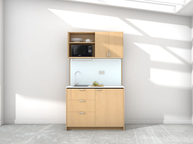 Charlie - 1.2m Compact Wall Unit Kitchenette. Displayed with 'Premium Oak' Cabinetry, 'Style White' Benchtop, and 'Sheer Bliss White' Splashback