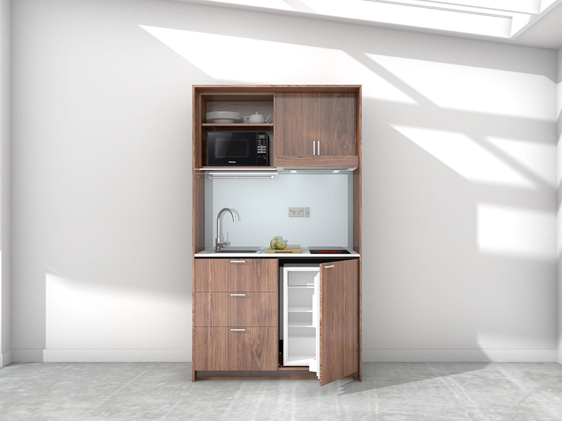 Blair - 1.2m Compact Wall Unit Kitchenette. Displayed with 'Hickory Walnut' Cabinetry, 'Style White' Benchtop, and 'Whisper Grey' Splashback